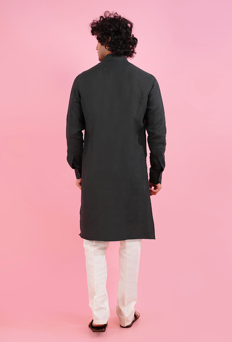 Black kurta pajama with self-textured linen design, ideal for ethnic events and casual wear.