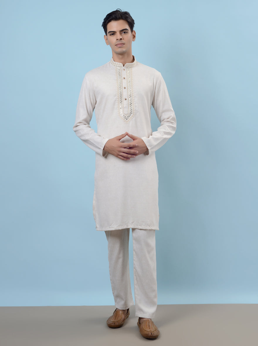 Celebrate in style with our white kurta pajama, perfect for festive gatherings and events.