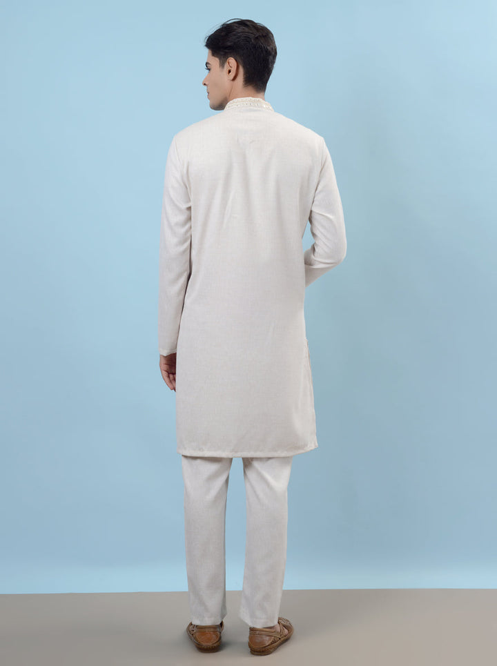 Unique white kurta pajama for men, crafted to enhance your festive wardrobe in the USA.