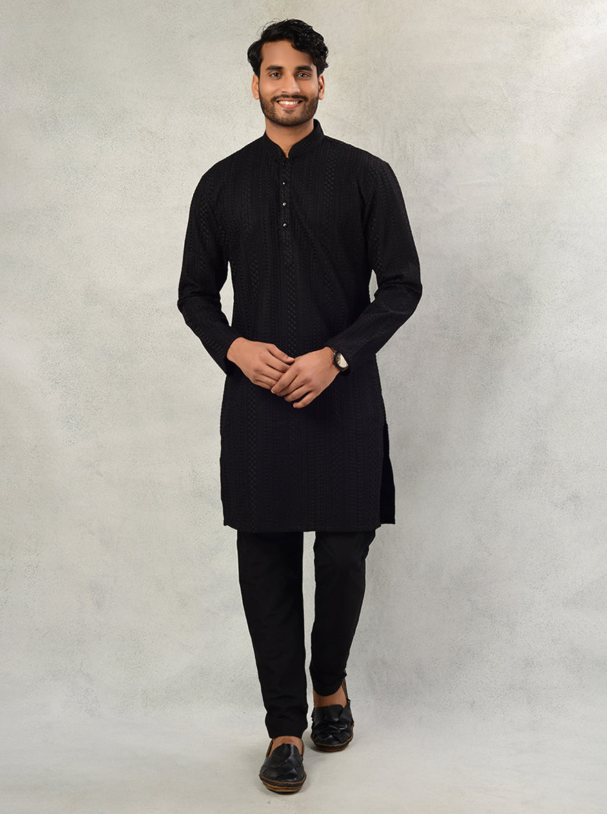 This luxurious black kurta pajama is ideal for weddings, ensuring a lasting impression at every gathering.