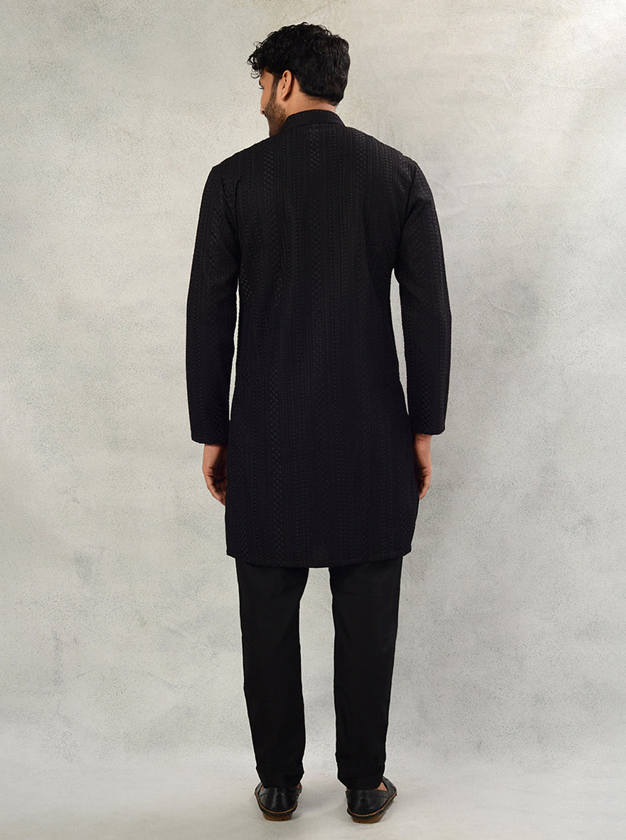 Elevate your festive wardrobe with this black embroidered kurta set, designed for style and sophistication.