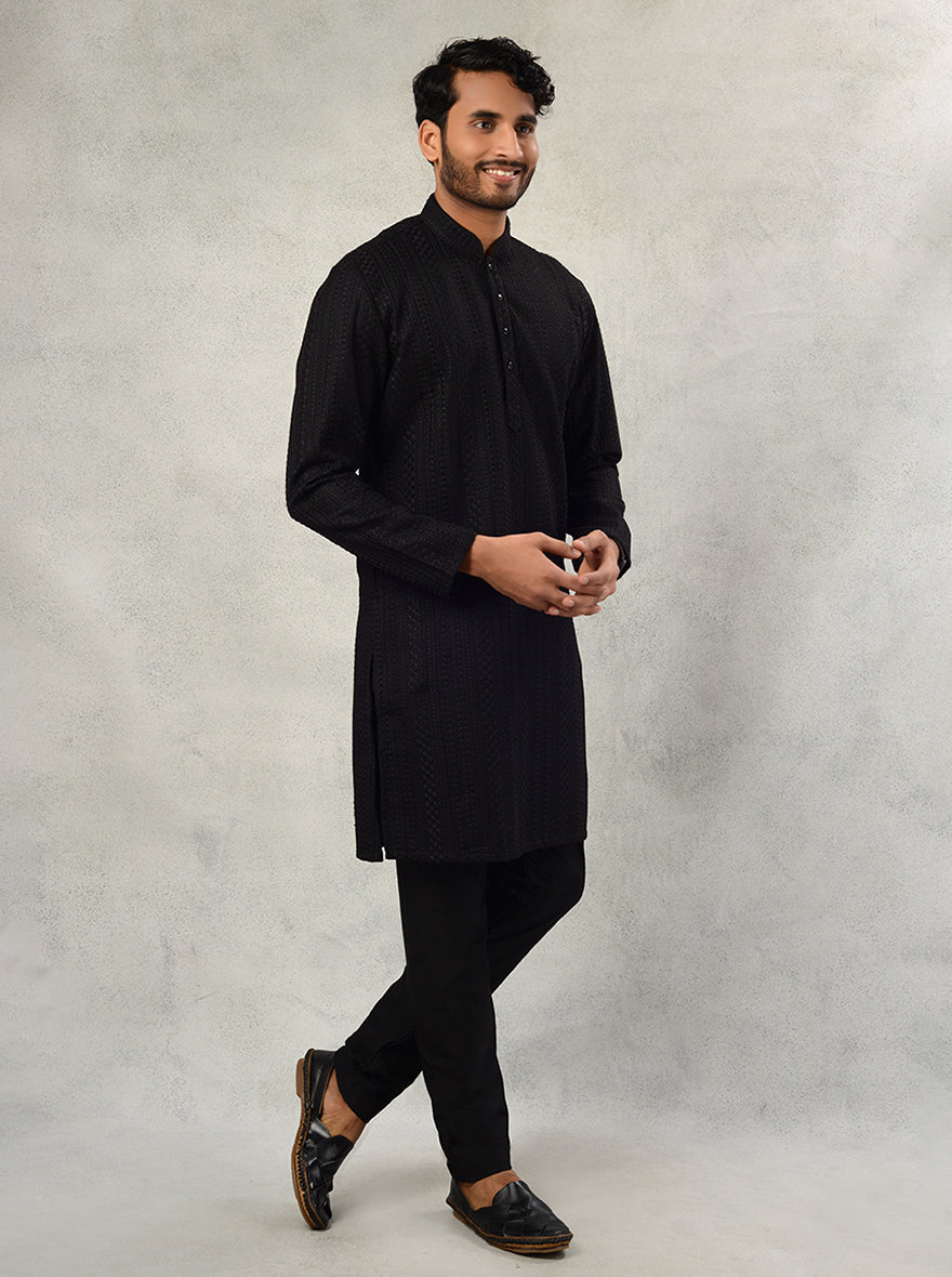 Make a statement at wedding celebrations in the USA with this elegant black kurta pajama for men.