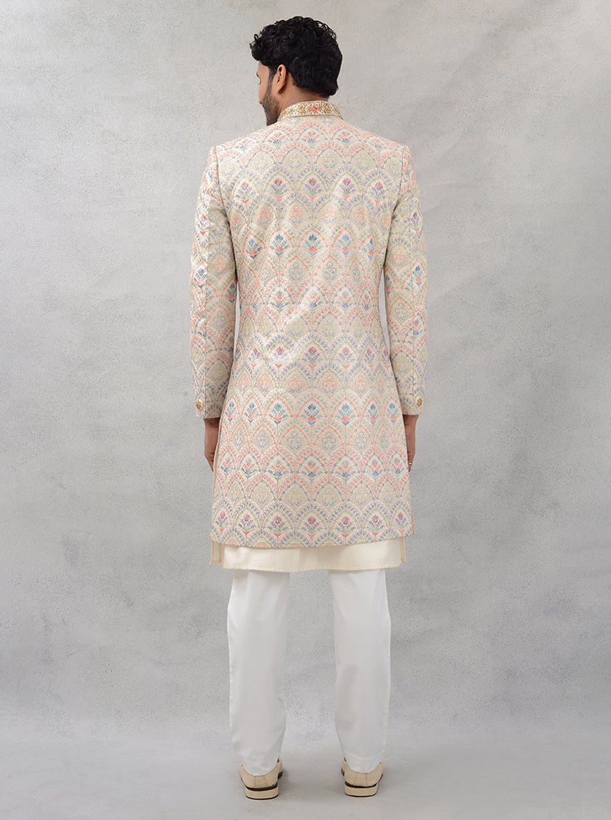 Perfect for any celebration, this cream sherwani combines luxurious silk with exquisite embroidery, allowing you to shine on your special day in the USA.