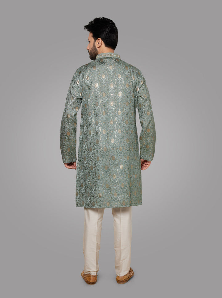 Traditional Mint Green Kurta Pajama for men, ideal for weddings and pooja ceremonies.