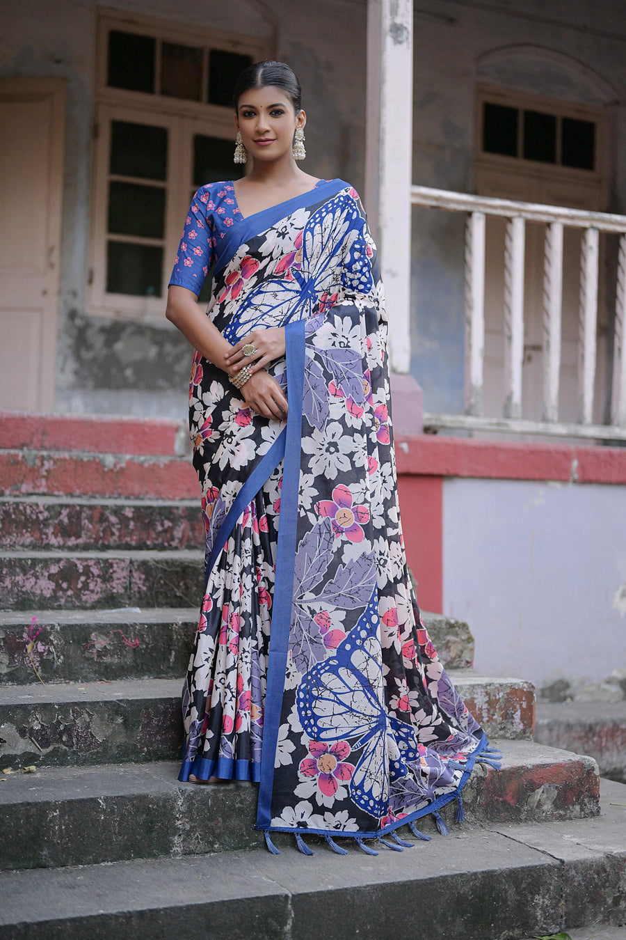 Timeless sandy silk saree with traditional floral print and fancy tassels