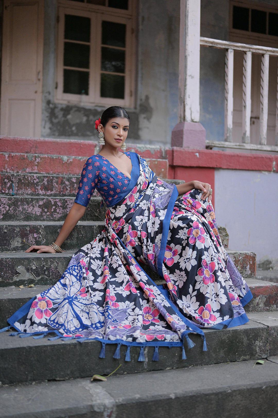 Beautiful sandy silk saree with traditional floral print and fancy tassels