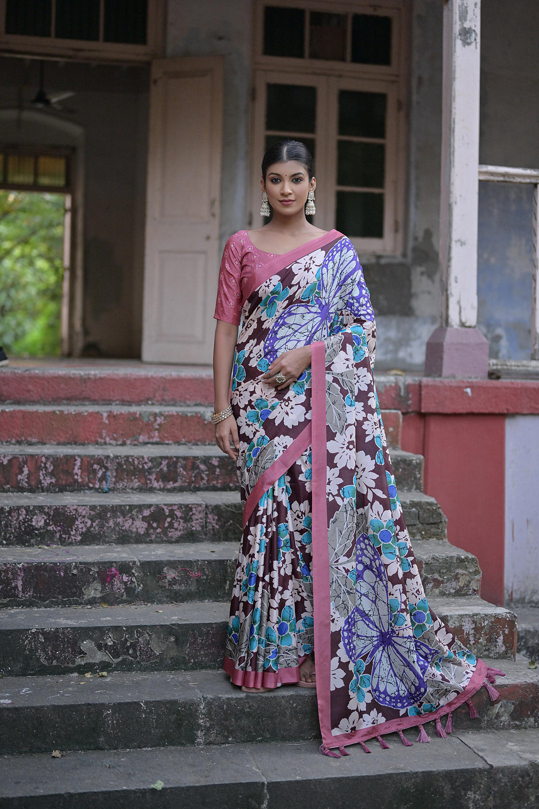 Traditional floral printed sandy silk saree with decorative tassels