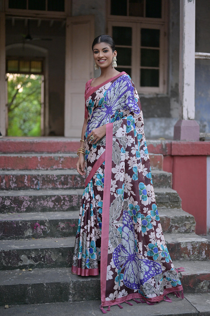 Sandy silk saree with floral design and fancy tassels for festive celebrations