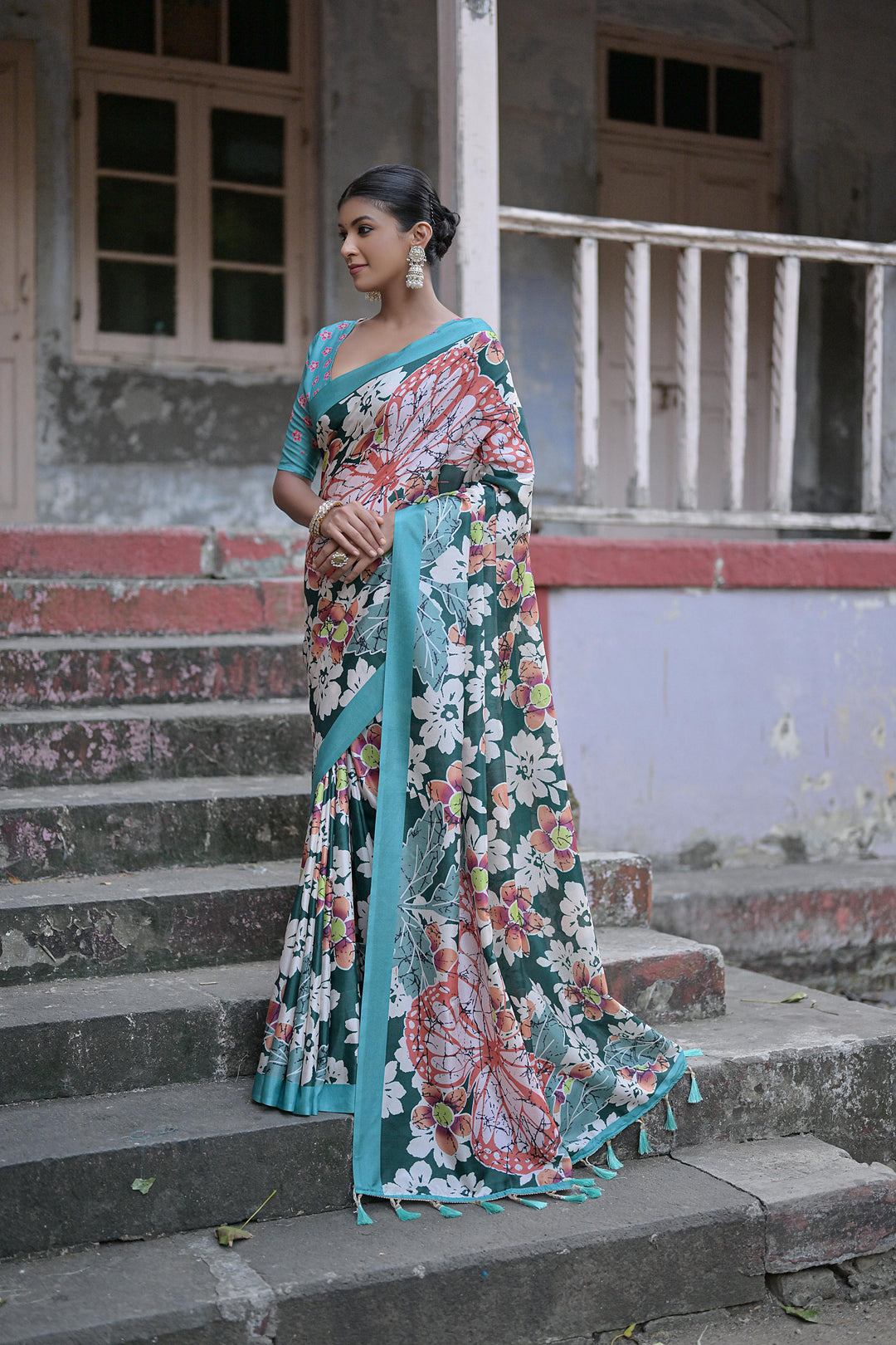 Festive sandy silk saree with floral print and tassel detailing on pallu