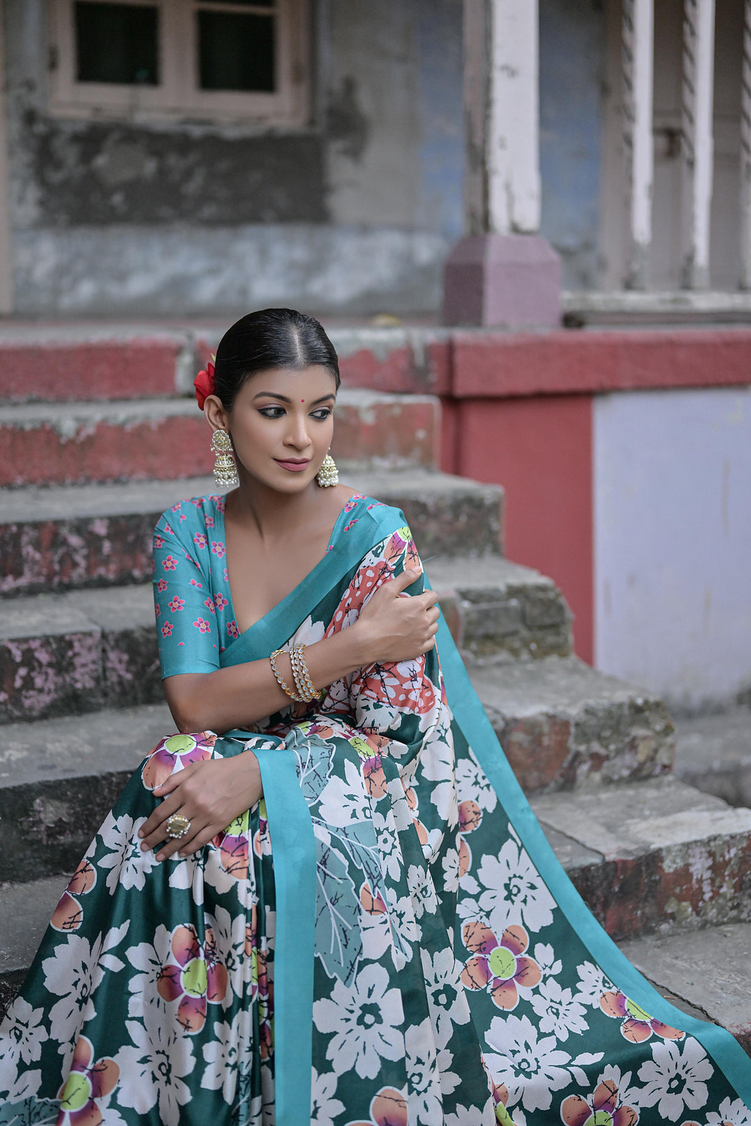 Sandy silk saree with traditional floral print and tassels for special events