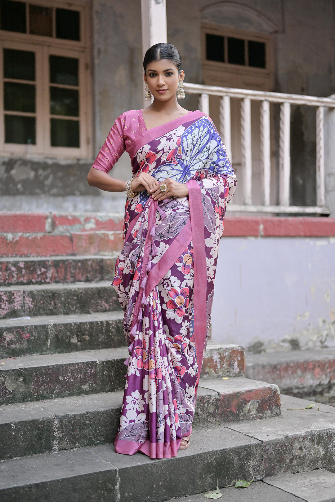 Soft sandy silk saree with fancy tassels and all-over floral print design