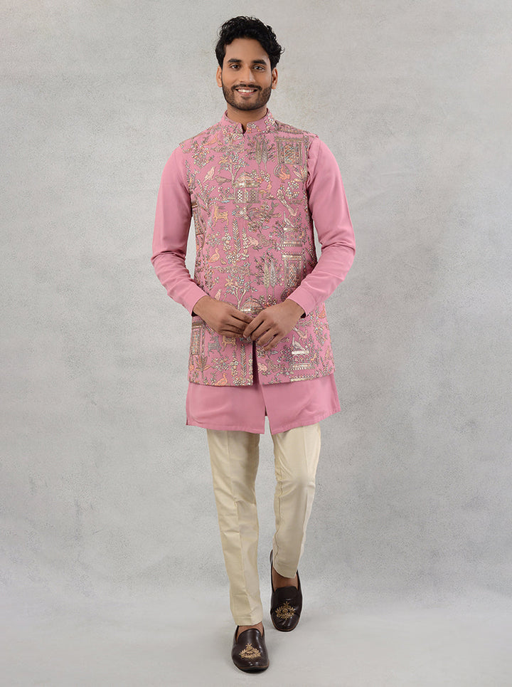 The premium Sun Silk fabric and beautiful embroidery make this pink Bandhgala jacket a must-have for your wardrobe.