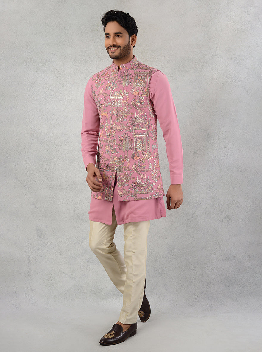 Make a statement at special events with this stunning pink Bandhgala jacket, blending luxury and traditional style.