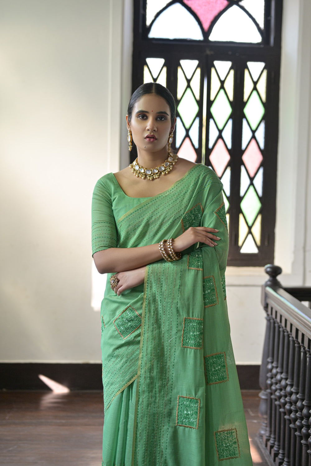 Elegant light-green Kantha stitch saree in handloom Khadi Tussar silk, perfect for adding grace to traditional occasions.