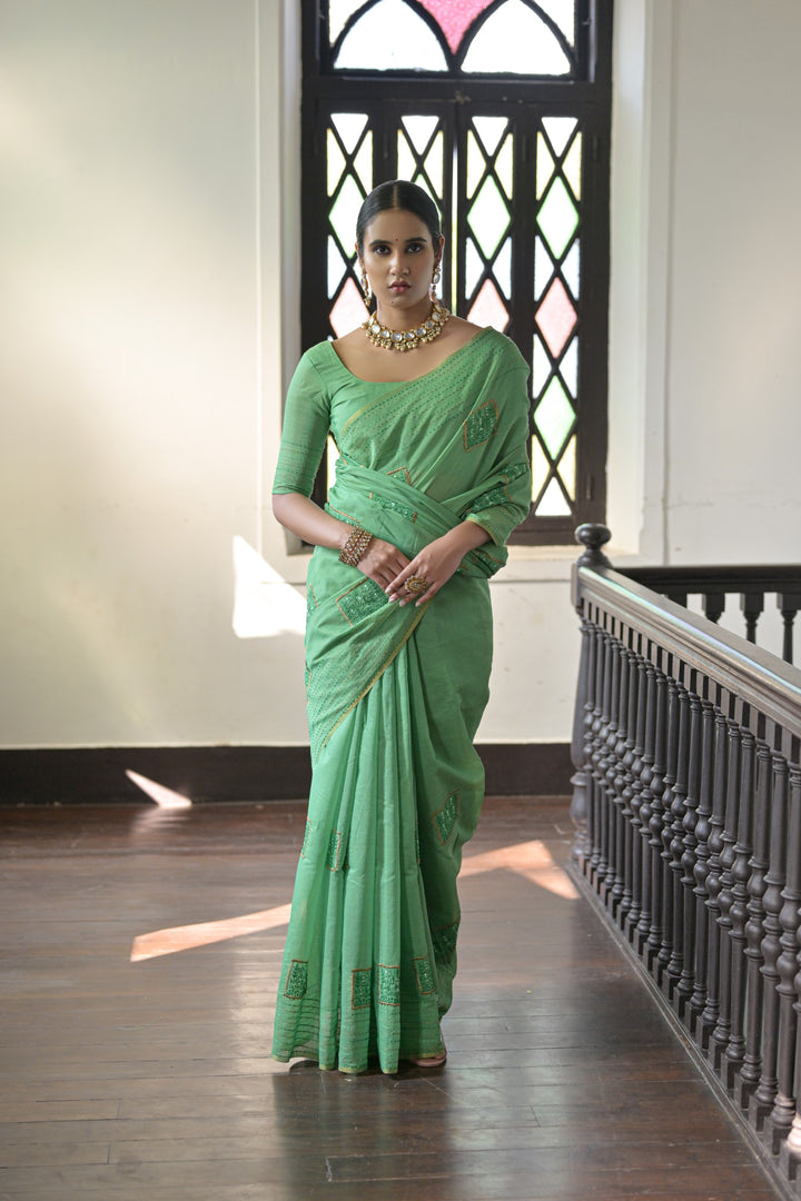 Gorgeous light-green Kantha stitch saree, handcrafted from Khadi Tussar silk, ideal for weddings and cultural events.