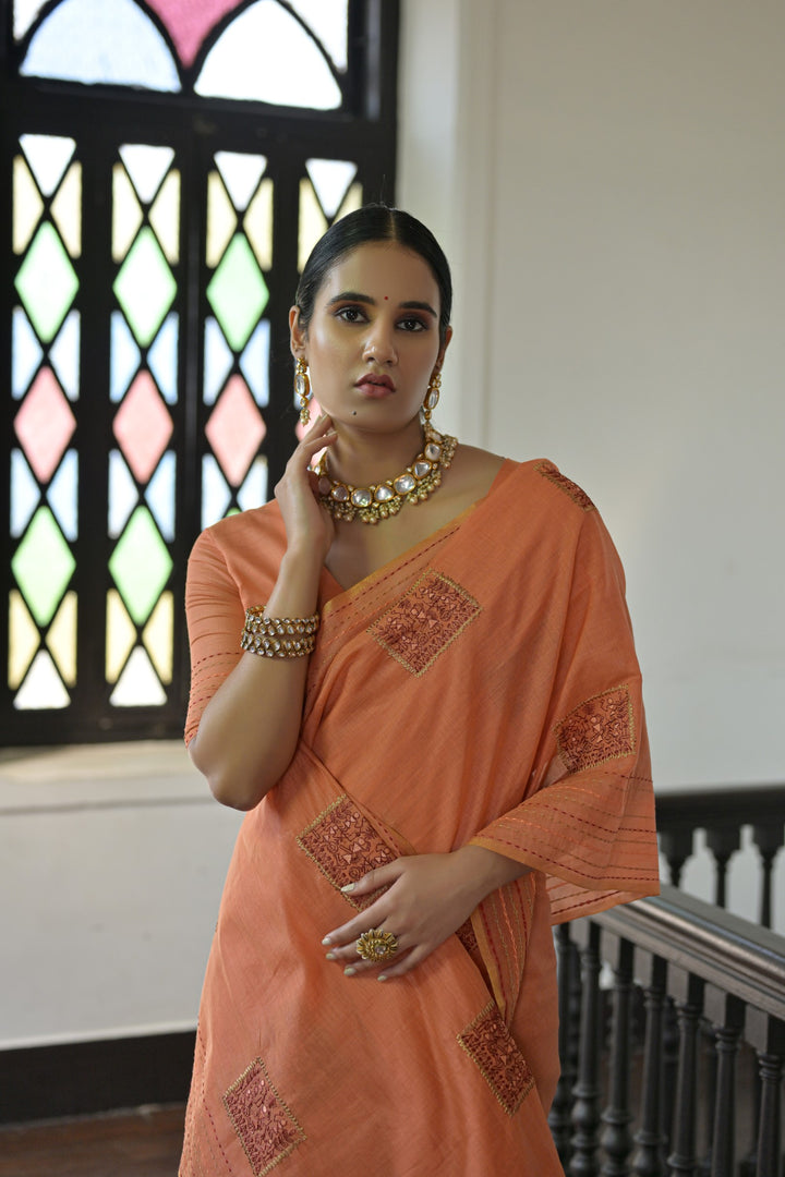 Beautiful orange Kantha stitch saree in handloom Khadi Tussar silk, adding a vibrant touch to your festive wardrobe.