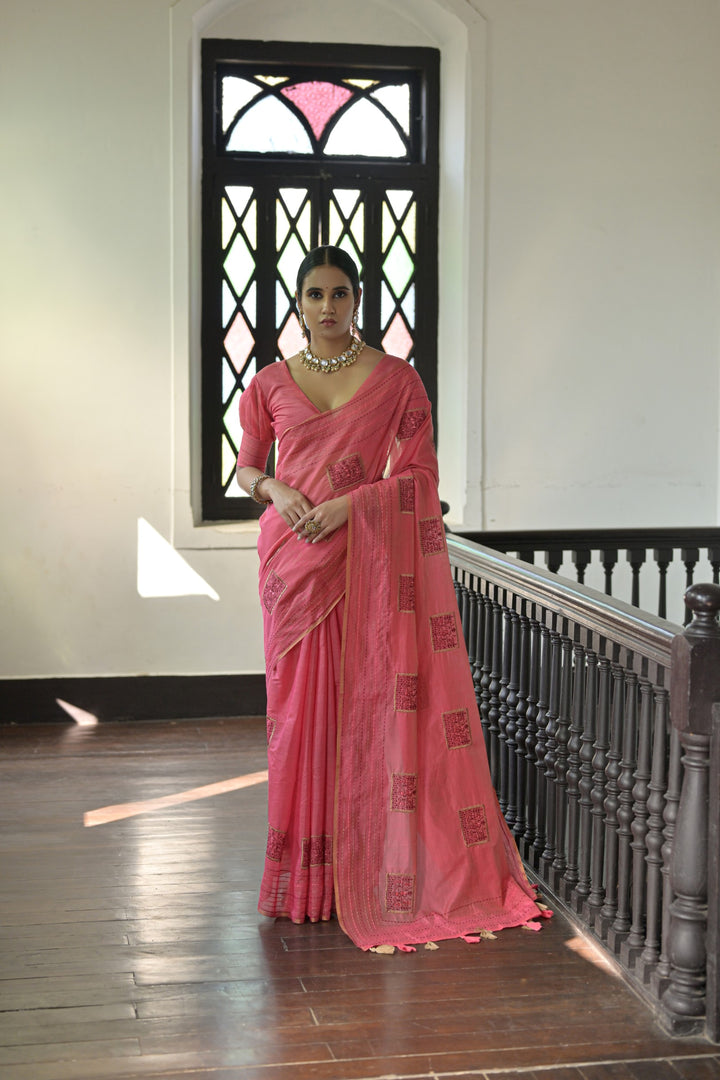 Elegant orange Kantha stitch saree with intricate Khadi Tussar silk weaving, ideal for weddings and celebrations.