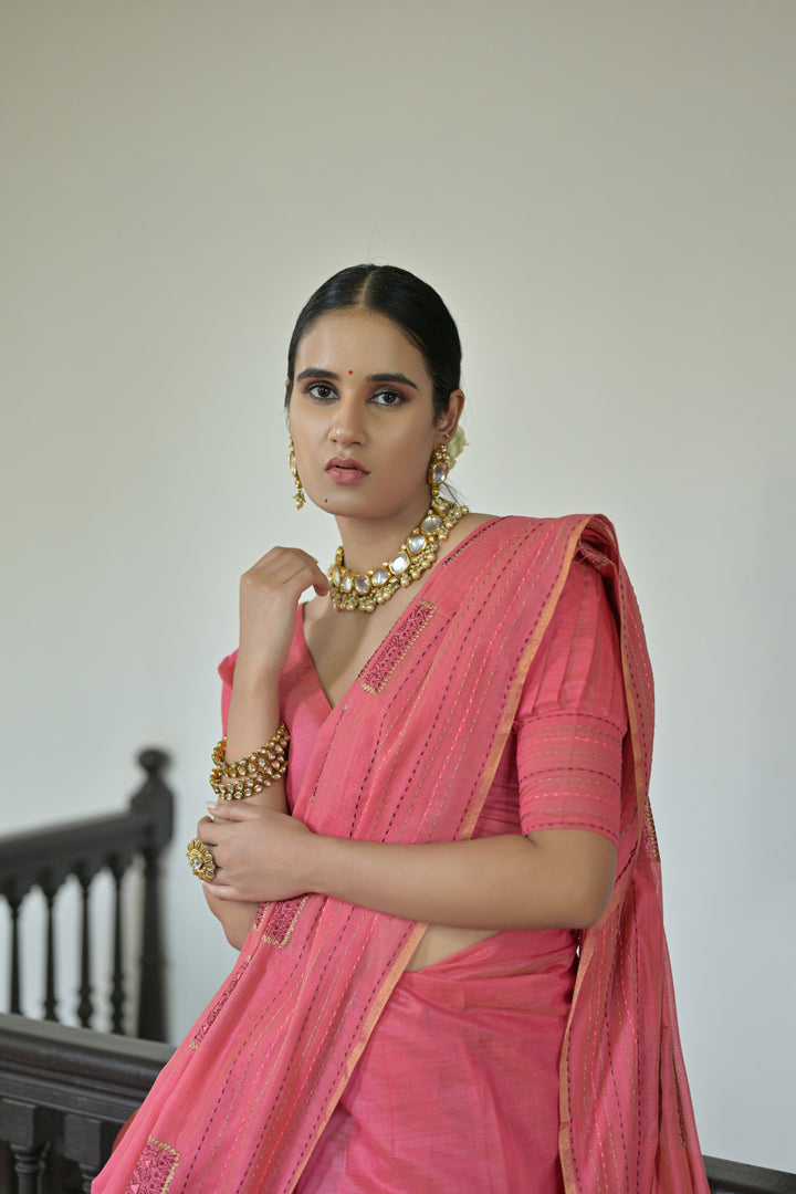 Lovely pink Kantha stitch saree made from handloom Khadi Tussar silk, showcasing delicate craftsmanship for festive elegance.