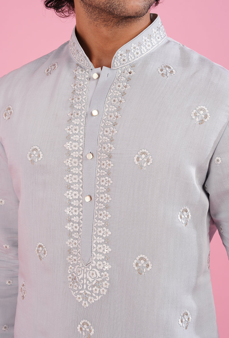 Stylish sky blue kurta pajama set for men with delicate embroidery, perfect for USA weddings.