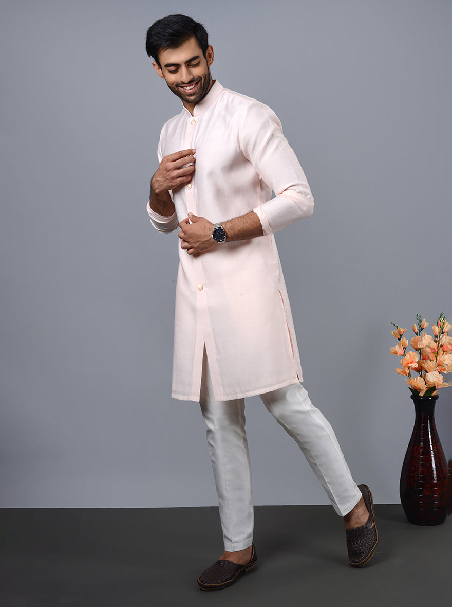 Comfortable pink kurta for men, ideal for celebrations and gatherings.