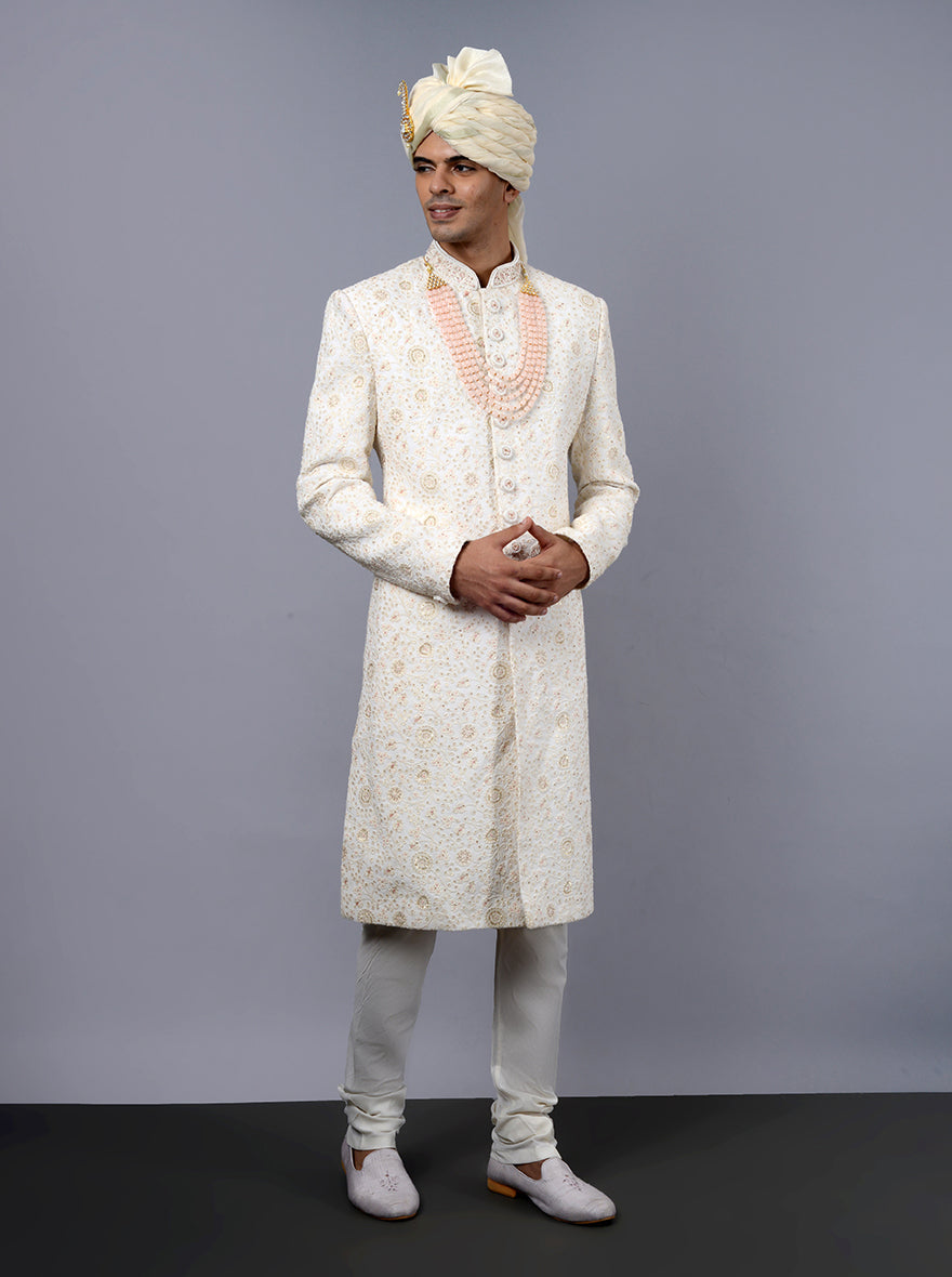 Luxurious silk blend cream sherwani with intricate embroidery, ideal for weddings in the USA.