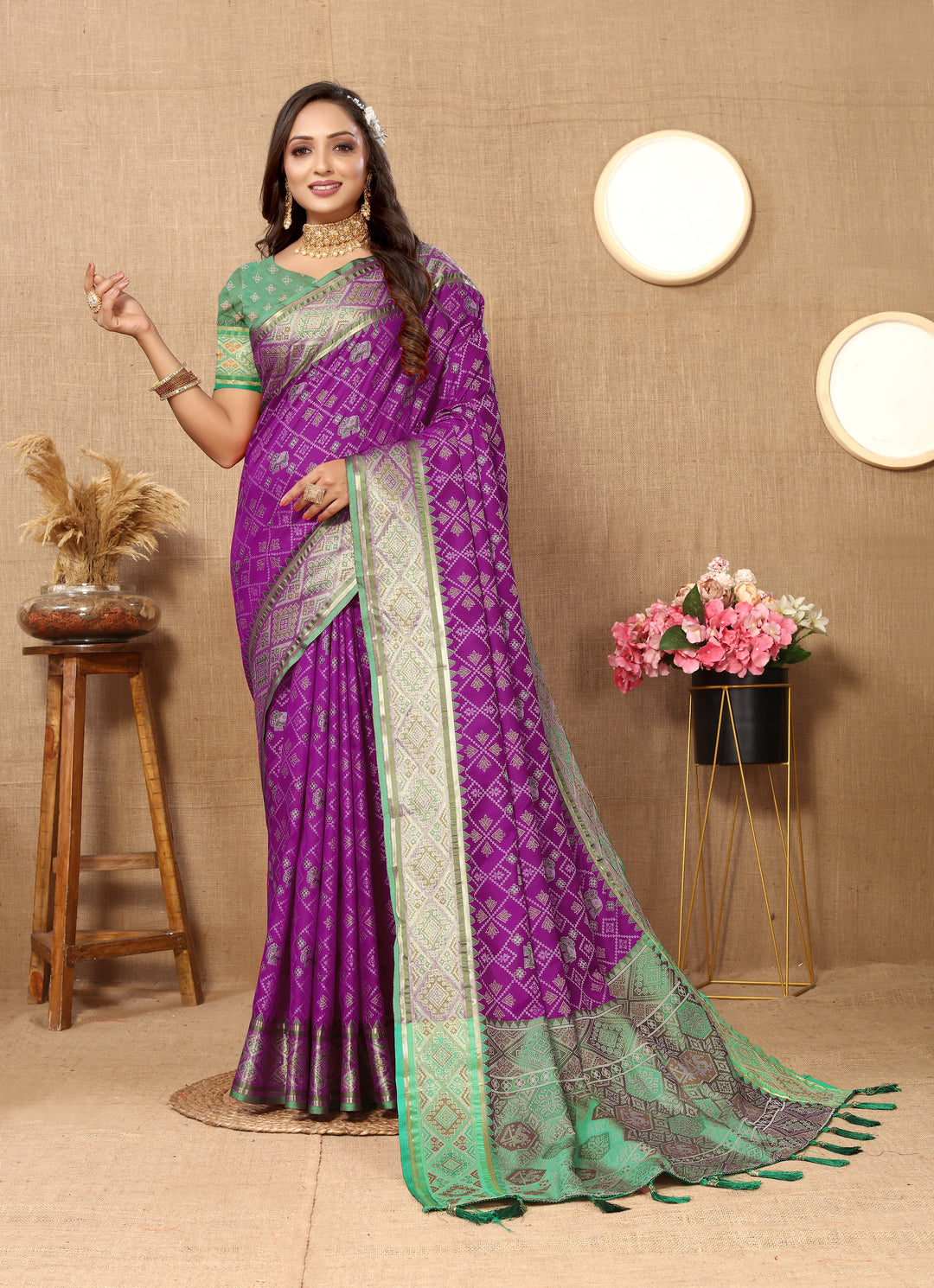 Elegant purple Patola silk sari with rich zari accents and intricate pallu, ideal for traditional celebrations.