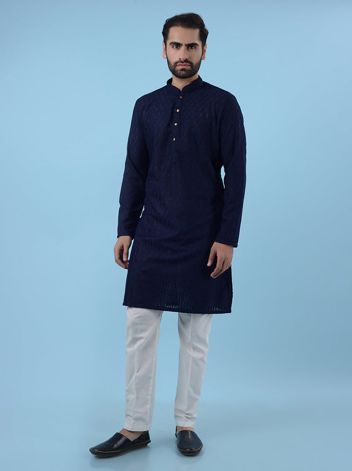 Stylish navy blue embroidered kurta pajama for men, perfect for weddings and cultural events.