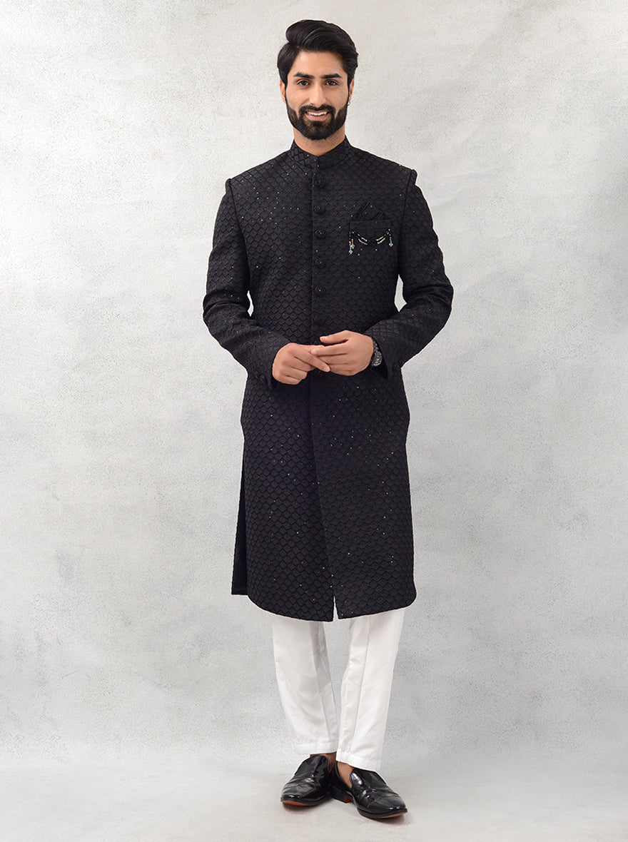 This black sherwani combines luxurious fabric with sophisticated design, ensuring you stand out at weddings and cultural celebrations in the USA.