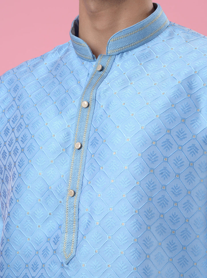 Perfect for gatherings, our sky-blue silk jacquard kurta pajama exudes sophistication and style.