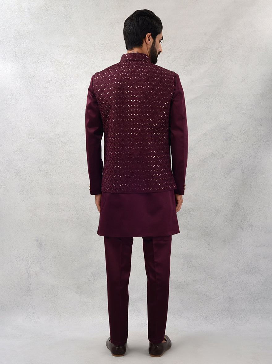 This wine kurta set combines traditional elegance with modern flair.