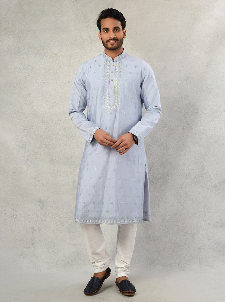 Elevate your ethnic wardrobe with this classic greyish blue kurta pajama, designed for modern men.