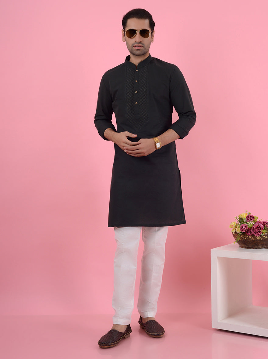 Luxurious dark green kurta pajama featuring exquisite embroidery, ideal for traditional celebrations in the USA.