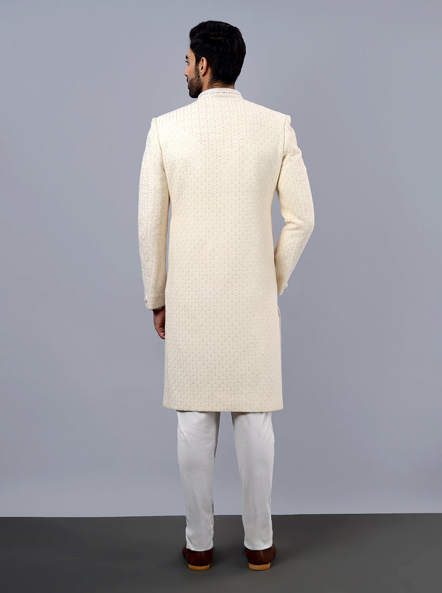 Luxurious cream sherwani with intricate craftsmanship, perfect for weddings across the USA.