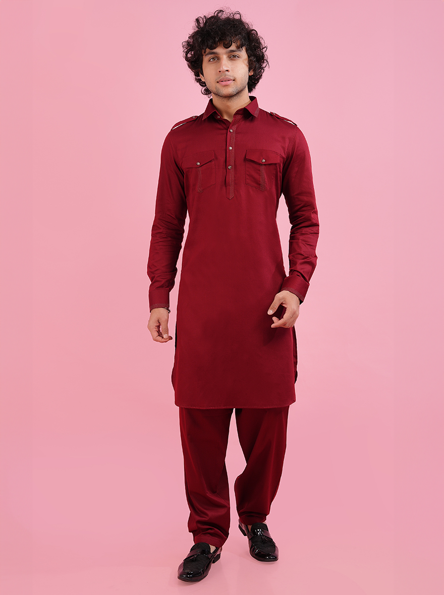 Discover elegance with this maroon Pathani kurta, crafted from premium silk blend fabric and featuring intricate thread work, ideal for weddings and celebrations.