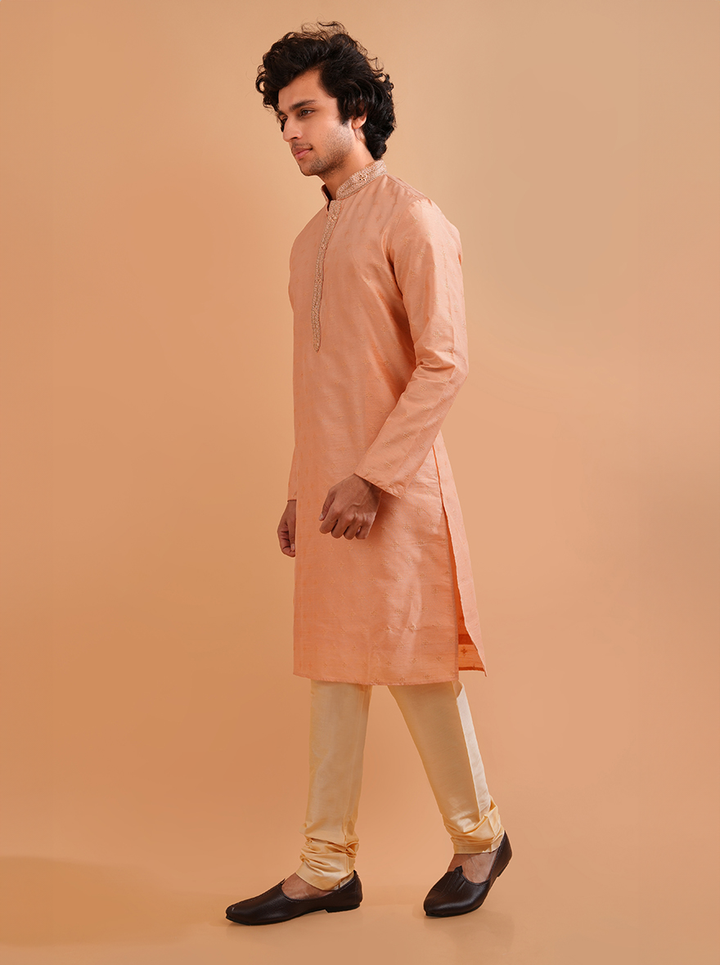 Celebrate in style with this self-designed peach silk kurta pajama, perfect for any occasion in the USA.