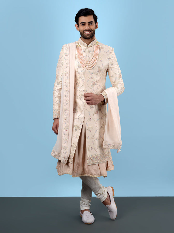 Elegant fawn peach sherwani featuring intricate resham, dori, and sequins work, perfect for weddings in the USA.