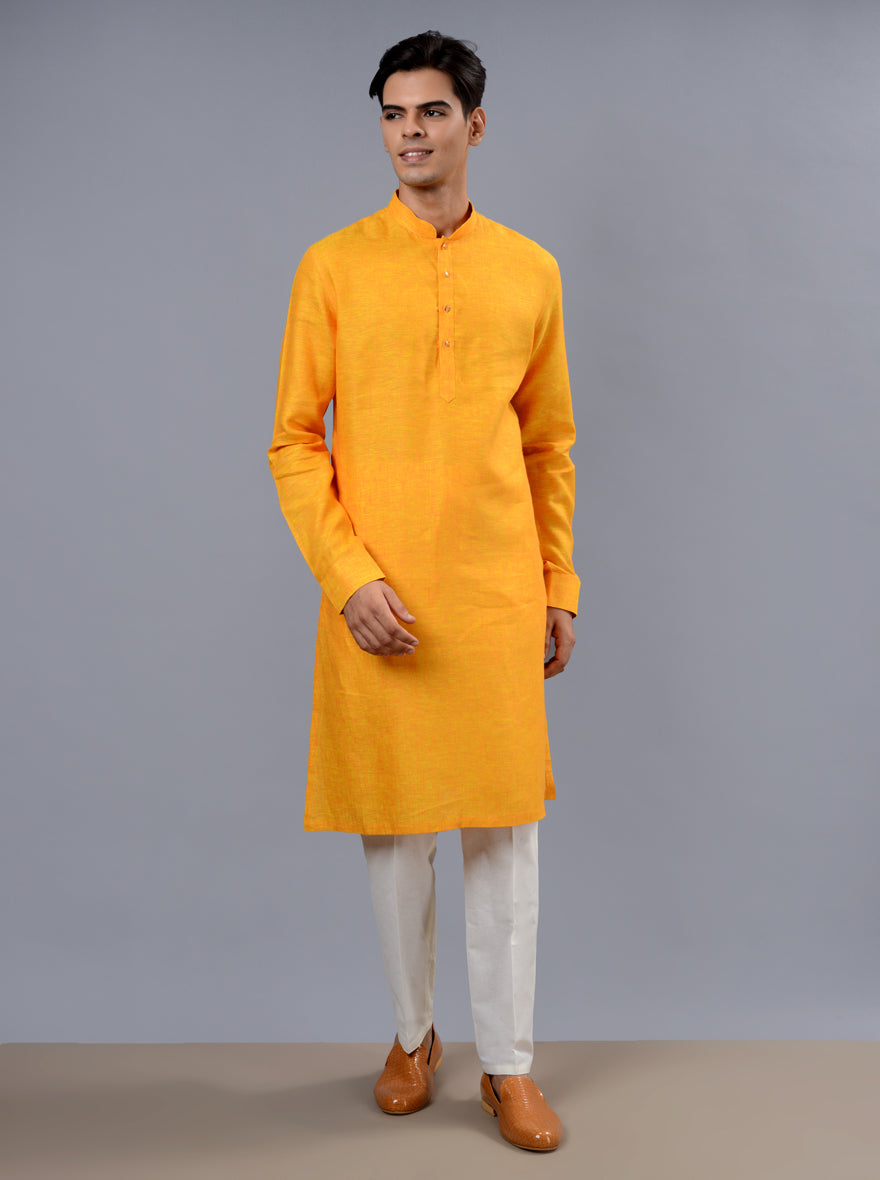 Stylish orange & yellow kurta pajama designed for celebrations and festive events.