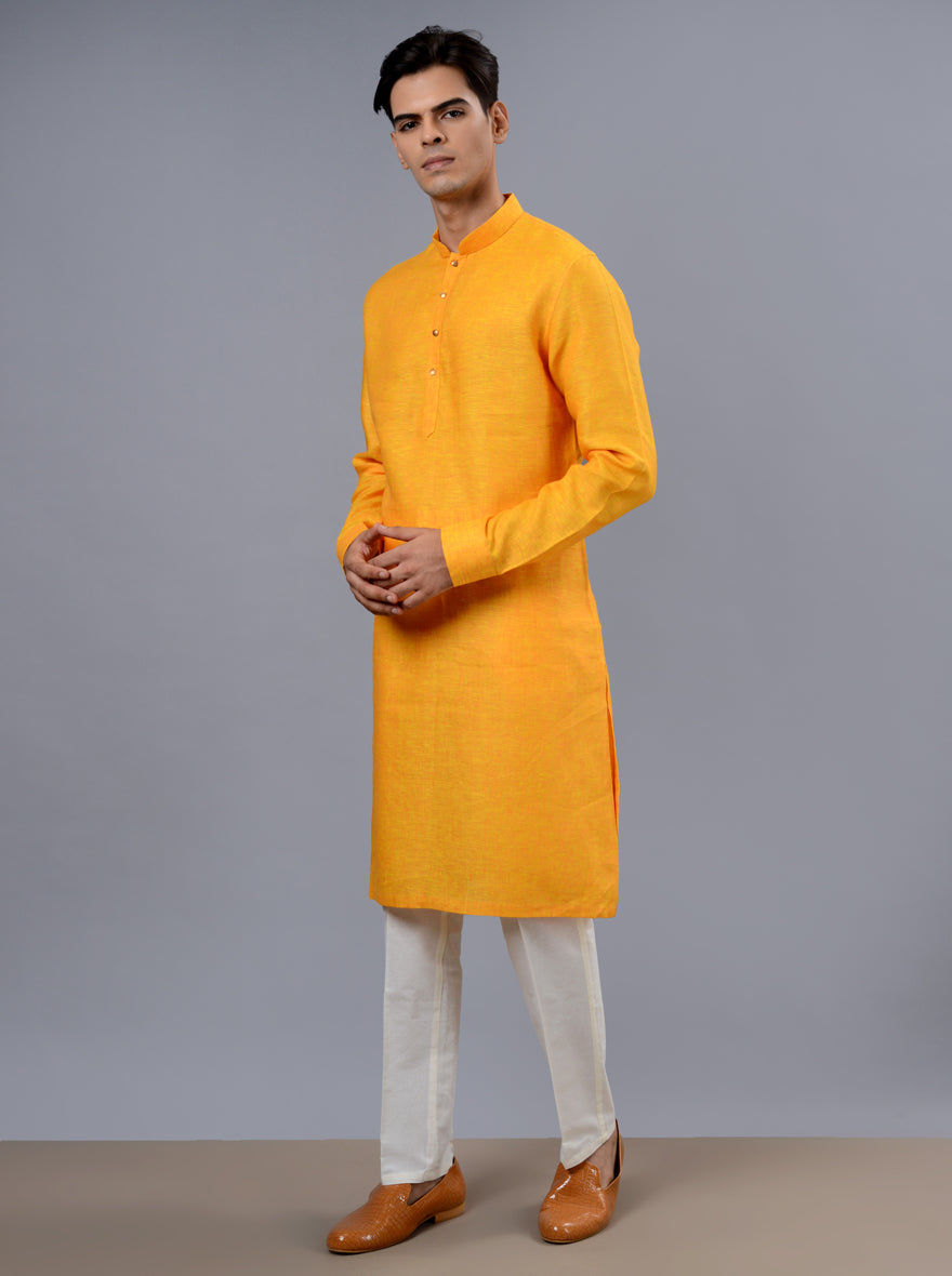 Unique orange & yellow kurta pajama for men, ideal for making a statement at gatherings.