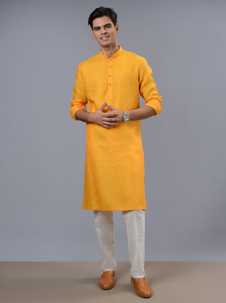 Embrace festive charm with our stylish orange & yellow kurta pajama set for men.