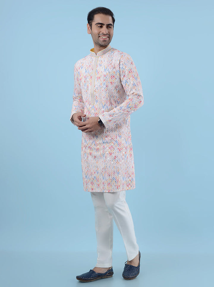 Shine at celebrations in the USA with this elegant white kurta pajama.