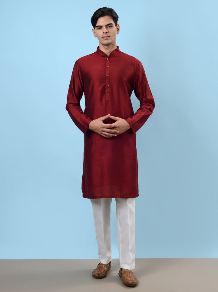 Unique maroon silk kurta pajama designed for men who appreciate tradition and sophistication.