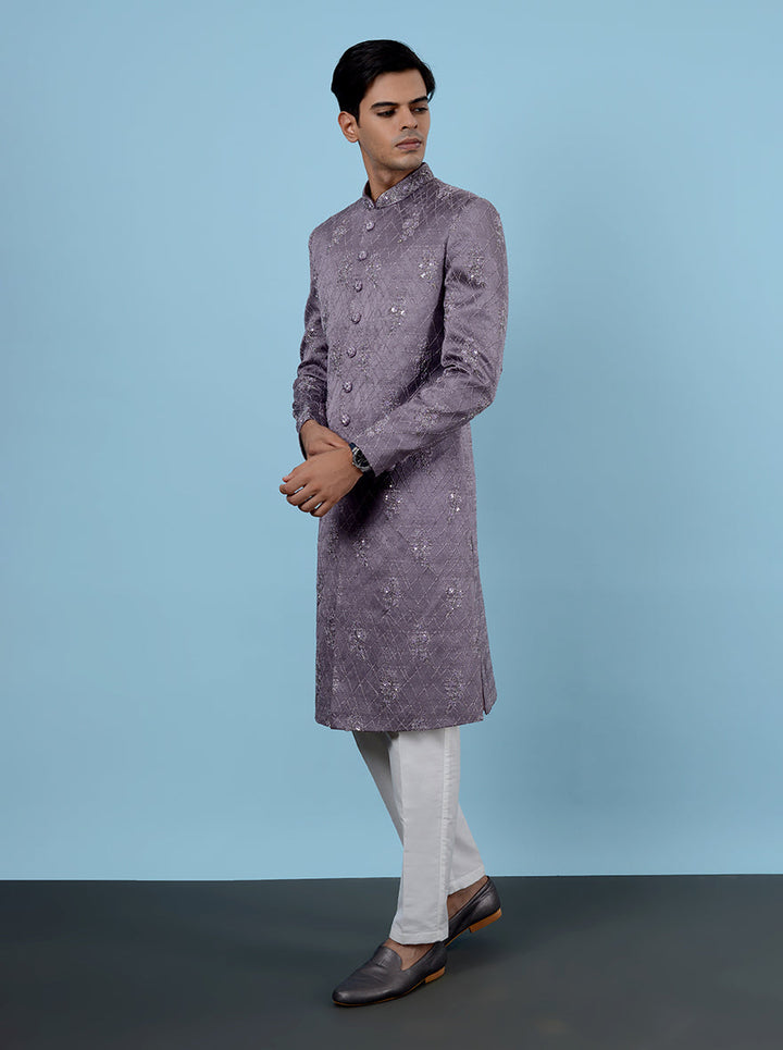 Shine at your next event with this elegant lavender Indo Western, crafted from silk jacquard for ultimate comfort and flair.