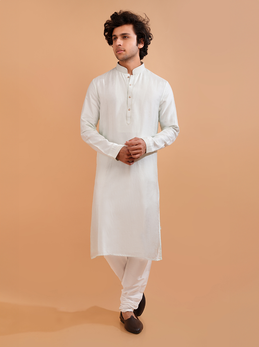 tand out in style with this stylish mint green silk blend kurta pajama, designed for comfort and sophistication.