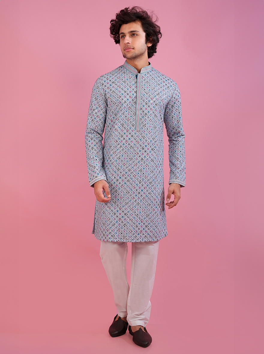 Elevate your ethnic wardrobe with this chic white and blue kurta pajama for modern celebrations in the USA.