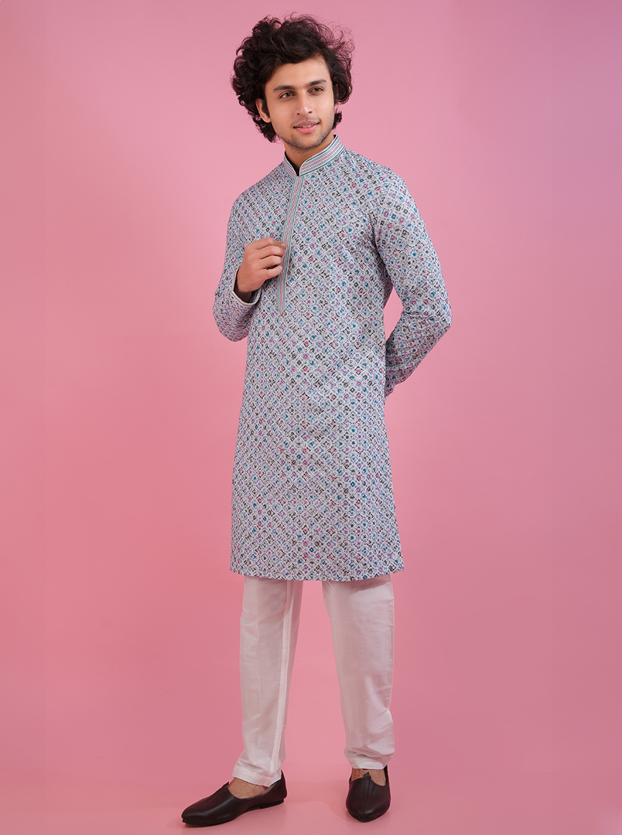 Stand out at gatherings with this elegant white and blue kurta pajama, designed for comfort and style.