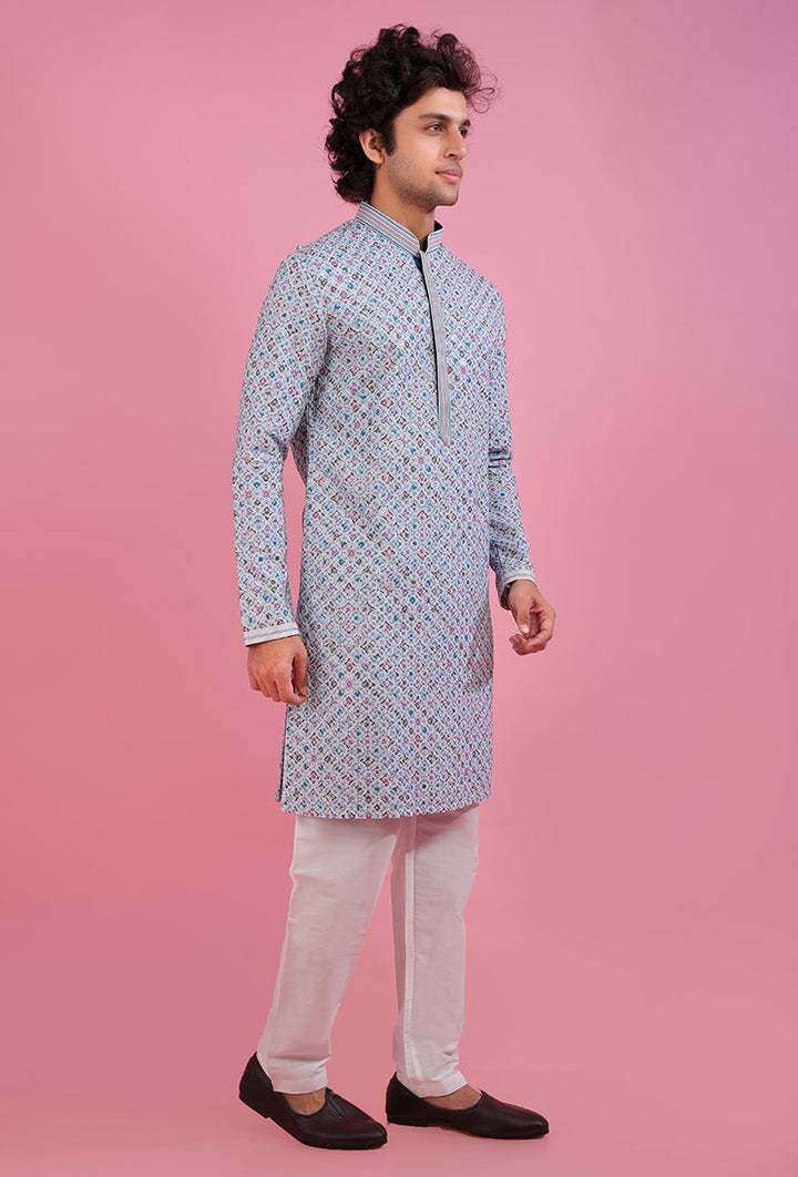 Traditional light blue silk blend kurta pajama set, designed with exquisite embroidery.