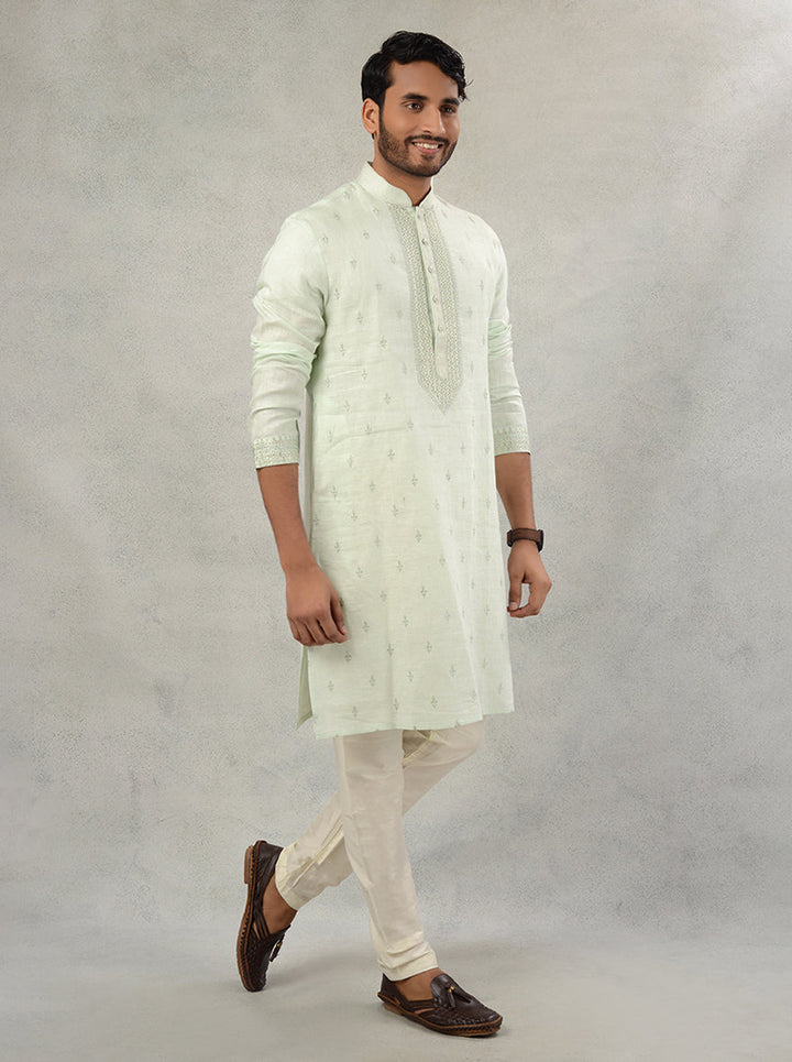 Celebrate in style with this Pista Green Linen Kurta Pajama, designed for modern men attending mehndi ceremonies.