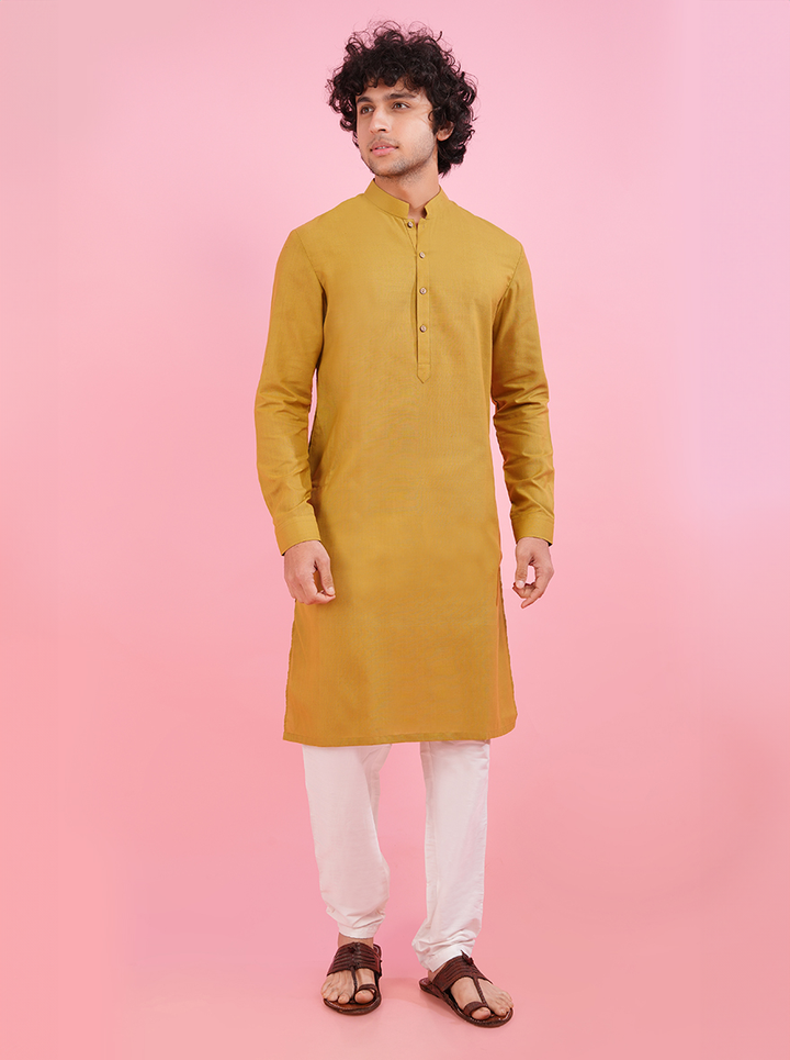 Celebrate occasions with this yellow khadi blend kurta pajama for men, offering traditional elegance in the USA.