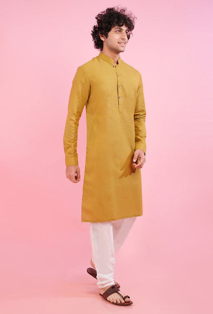 Enhance your ethnic wardrobe with this yellow khadi kurta pajama, combining comfort and modern design in the USA.