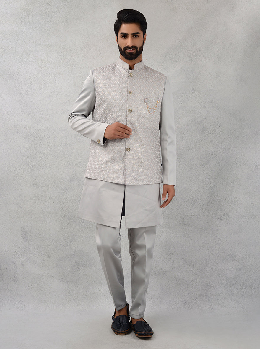 Celebrate in style with this grey silk kurta pajama, designed for confident men attending special occasions.